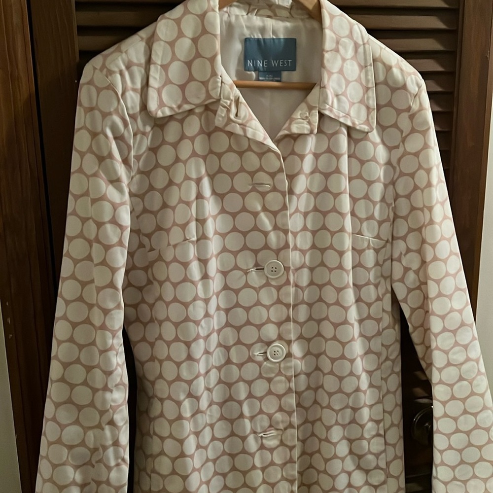 Nine West Women’s trench coat cream and pink poke a dots size L. Barley worn